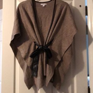 sweater poncho with black leather accents